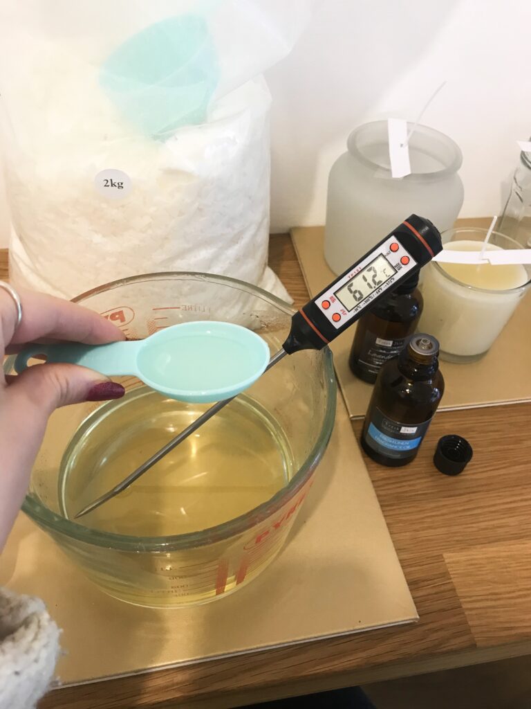 Adding essential oils to soy wax for candle making