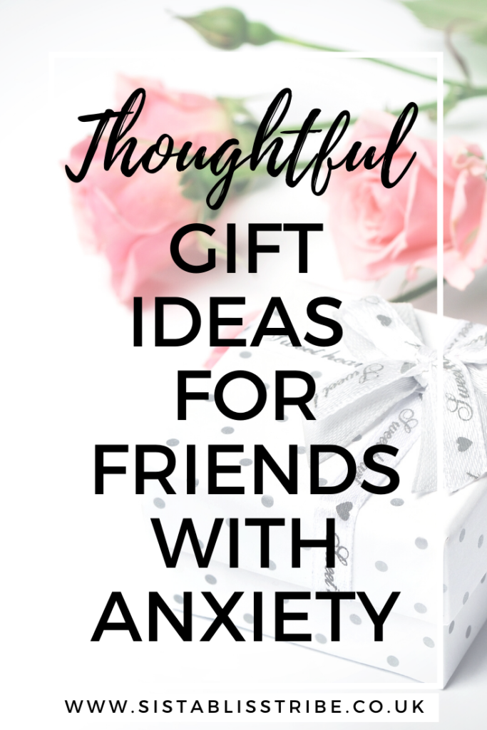 Thoughtful gift ideas for friends with anxiety. Pink roses and a wrapped gift box.