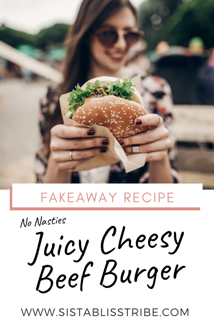 Girl with sunglasses holding a burger