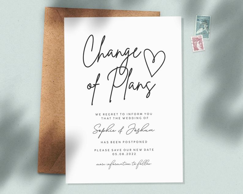 White Change of plans card with brown envelope