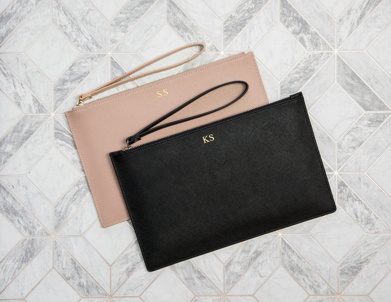 Pink and black clutch bags